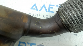 The inlet pipe with the catalytic converter of the Audi A3 22-26 is crushed, the mesh is torn