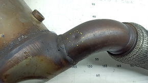 The inlet pipe with the catalytic converter of the Audi A3 22-26 is crushed, the mesh is torn