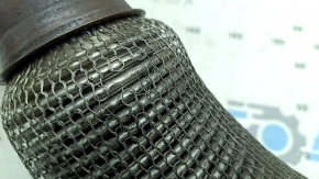 The inlet pipe with the catalytic converter of the Audi A3 22-26 is crushed, the mesh is torn