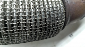 The inlet pipe with the catalytic converter of the Audi A3 22-26 is crushed, the mesh is torn
