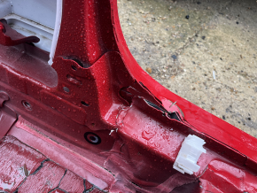 The central right body pillar of Lexus UX 19-26 on the body is dented