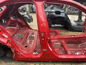 The central right body pillar of Lexus UX 19-26 on the body is dented