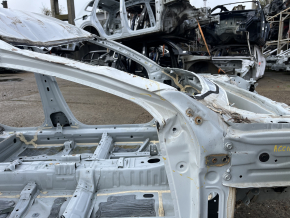 Front right quarter of Honda Accord 23-26 on the body, white, dented pillar