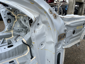 Front right quarter of Honda Accord 23-26 on the body, white, dented pillar