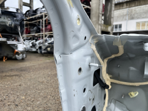 Front left quarter of Honda Accord 23-26 on the body, white, dented pillar