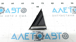 Triangle corner of the front left wing of VW Taos 22-25 with chrome molding