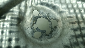 The muffler heat shield of the Audi A3 22-26 is crushed, the fasteners are corroded