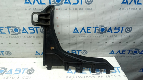 The rear right underbody protection of the Audi A3 22-26 is worn and torn