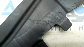 The rear right underbody protection of the Audi A3 22-26 is worn and torn
