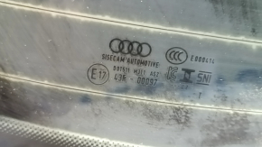 The rear window of the Audi A3 22-26 is covered in soot, the heating system is defective, and there is oxidation