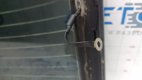 The rear window of the Audi A3 22-26 is covered in soot, the heating system is defective, and there is oxidation