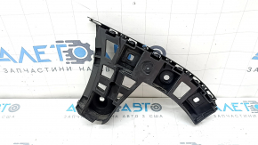 The rear bumper mount, outer left, VW Taos 22-25, is broken