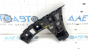 The rear bumper mount, outer right, VW Taos 22-25, is broken