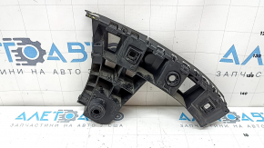 The rear bumper mount, outer right, VW Taos 22-25, is broken
