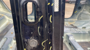 The central right body pillar of the Kia Niro 17-22 HEV, PHEV on the body, is dented