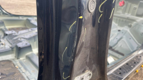 The central right body pillar of the Kia Niro 17-22 HEV, PHEV on the body, is dented