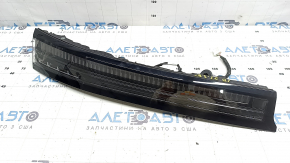 The inner tailgate light, left, Nissan Murano 25-26, is glued