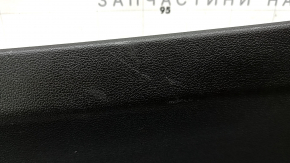Lower trunk door trim VW Taos 22-25 black, scratches