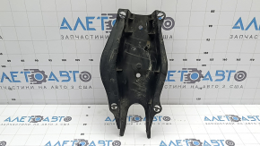 The rear right control arm cover under the spring of a Mercedes C-class W205 16-21 has broken fasteners, scratches, and a tear