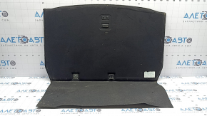 The trunk floor of a Mercedes C-class W205 300/400/450/43/63 16-21 is black and needs cleaning, there are scratches on the handle