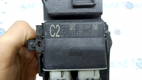 Foot-operated trunk opening sensor for Toyota Highlander 20-23 with a bracket for a towbar, the bracket is broken