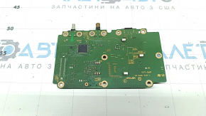 The control unit for the lane keeping camera for Nissan Murano 25-26 has a melted connector, is covered in soot, and the connector is missing