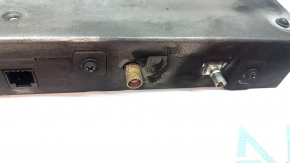 The control unit for the lane keeping camera for Nissan Murano 25-26 has a melted connector, is covered in soot, and the connector is missing