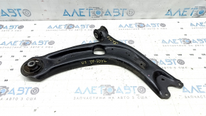 The lower front right control arm of a VW Taos 22-25 has a torn silent block