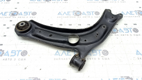 The lower front right control arm of a VW Taos 22-25 has a torn silent block