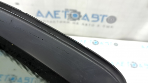 Rear left window, blind glass, VW Taos 22-25, tinted with chrome molding, scratches on chrome, cut seal