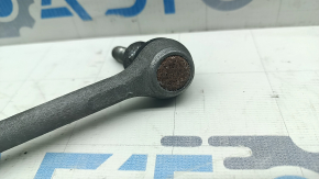 The front left stabilizer link of the Nissan Kicks 20-24 is rusty