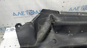 The front right underbody protection of Nissan Murano 25-26 is dented