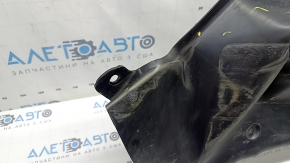 The front right underbody protection of Nissan Murano 25-26 is dented