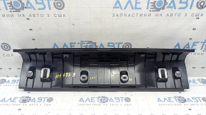 The trunk opening trim for BMW 3 G20 19-26 is black, scratches, and the fasteners are broken