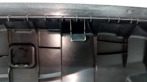 The trunk opening trim for BMW 3 G20 19-26 is black, scratches, and the fasteners are broken