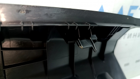 The trunk opening trim for BMW 3 G20 19-26 is black, scratches, and the fasteners are broken