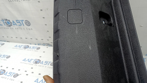 The trunk opening trim for BMW 3 G20 19-26 is black, scratches, and the fasteners are broken