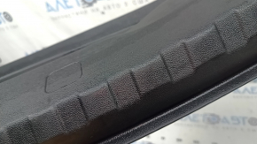 The trunk opening trim for BMW 3 G20 19-26 is black, scratches, and the fasteners are broken