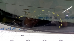 Rear glass of the trunk door of Nissan Murano 25-26 in glue