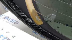 Rear glass of the trunk door of Nissan Murano 25-26 in glue