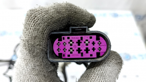 Wiring for the front bumper of a Porsche Macan 15-26 for parking sensors and fog lights, the wires are frayed