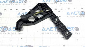 The rear bumper mount, left, Kia Sportage 23-25, is broken