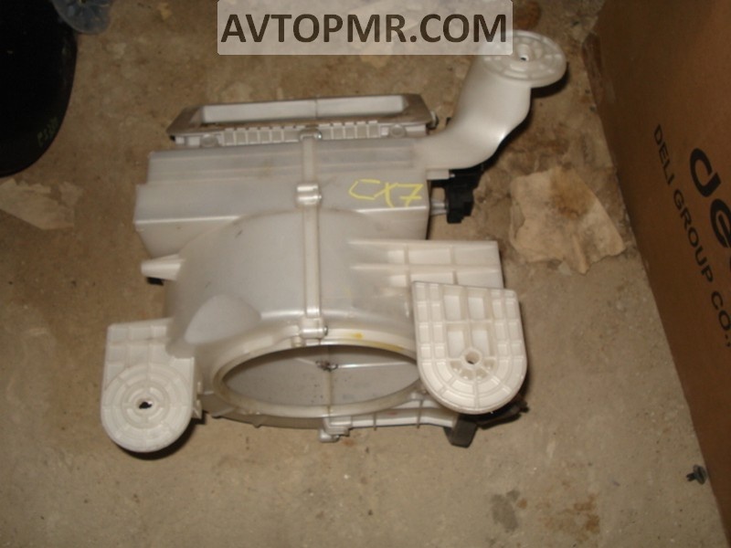 The bare fan housing, right side of the Mazda CX-7 06-09