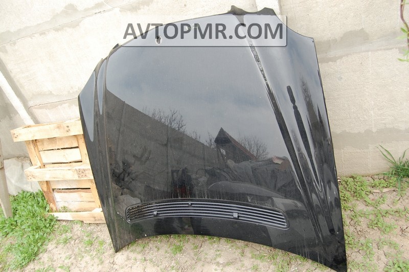The bare hood of a Mercedes W211 resto
