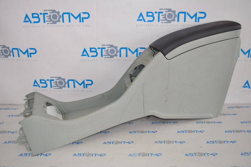 The center console from the armrest to the cup holder of the Toyota Prius 30 10-11 is gray.