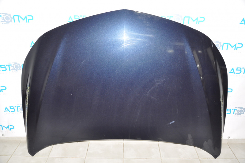 The bare hood of a 1920 Chevrolet Malibu