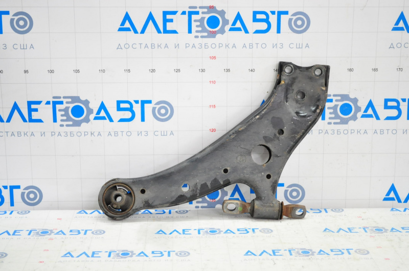 The lower front right control arm of a Lexus RX350 RX450h 10-15 has a torn silent block.