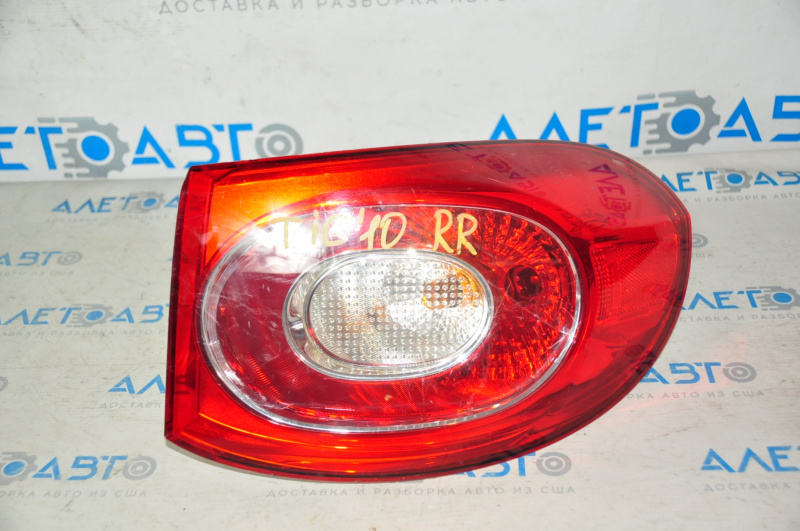 Right outer fender light for a VW Tiguan 09-11 pre-restoration, spider web on the glass