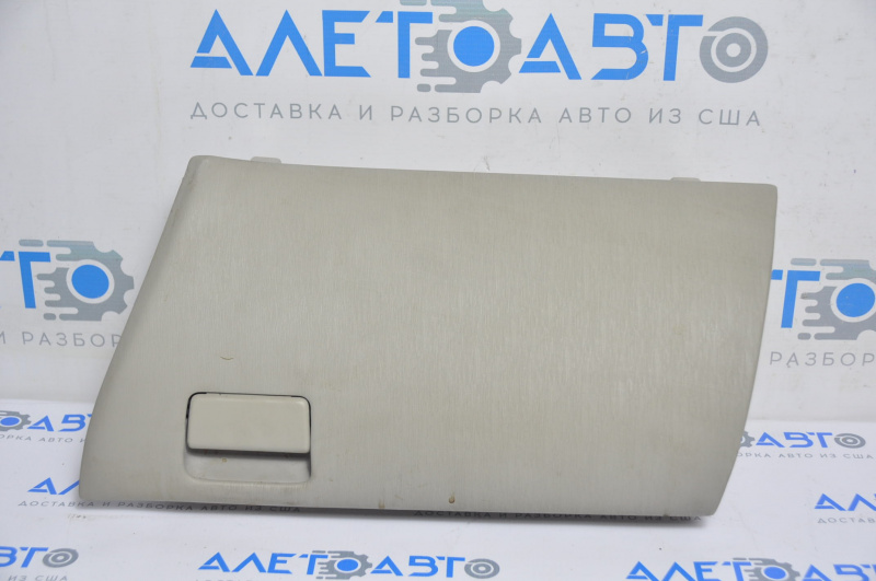 The glove compartment, glove box, upper compartment of the Toyota Prius V 12-17 beige