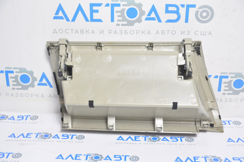 The glove compartment, glove box, upper compartment of the Toyota Prius V 12-17 beige